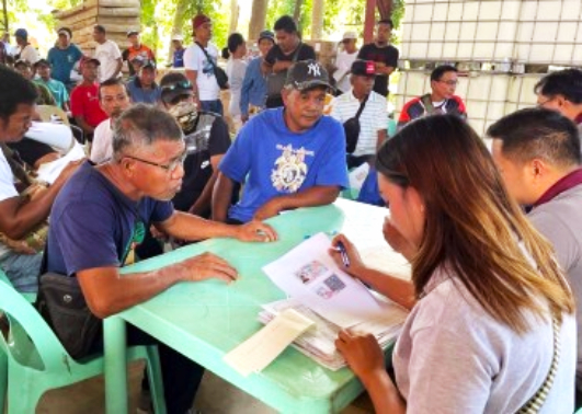 Over 1,100 Laoag farmers receive crop insurance payouts from PCIC
